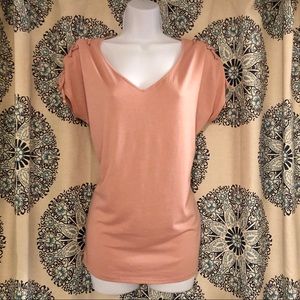 NWOT Baby pink lace up sleeve.